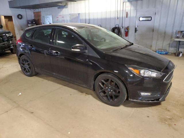 1FADP3K22GL346191 - 2016 FORD FOCUS SE BLACK photo 4