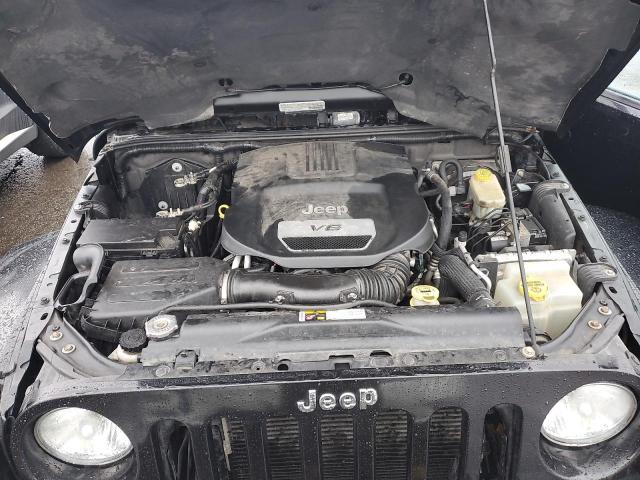1C4BJWEG1EL258760 - 2014 JEEP WRANGLER U SAHARA BLACK photo 12