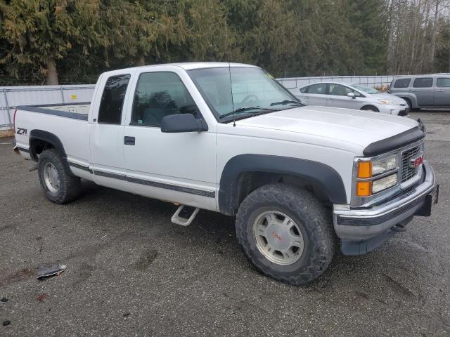 2GTEK19R4V1555732 - 1997 GMC SIERRA K1500 WHITE photo 4