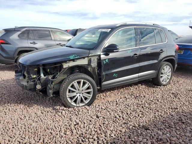 WVGAV7AX6GK000332 - 2016 VOLKSWAGEN TIGUAN S BLACK photo 1