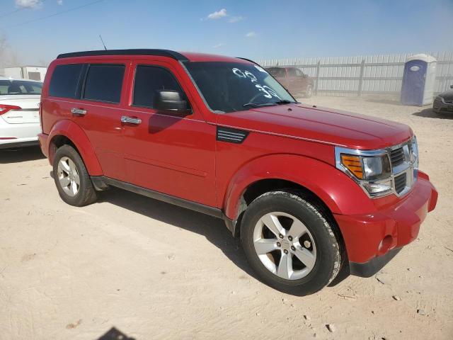 1D4PT2GK8BW602995 - 2011 DODGE NITRO SE RED photo 4