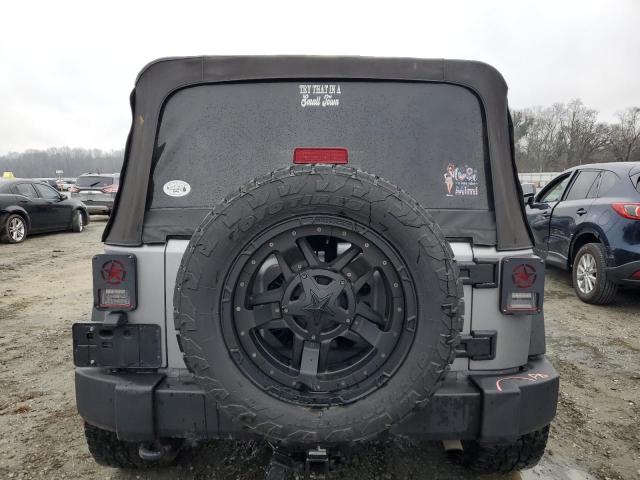 1C4HJWDG5GL109055 - 2016 JEEP WRANGLER U SPORT GRAY photo 6