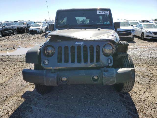 1C4BJWDG3JL878554 - 2018 JEEP WRANGLER U SPORT GRAY photo 5