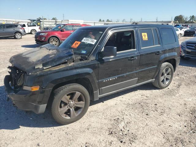 1C4NJPFA0ED813513 - 2014 JEEP PATRIOT LATITUDE BLACK photo 1