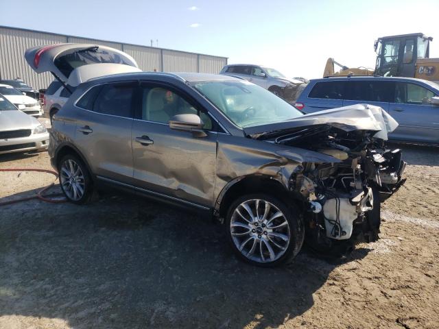 5LMCJ3C94GUJ31580 - 2016 LINCOLN MKC RESERVE GRAY photo 4