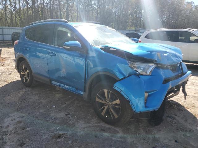 2T3WFREV6JW424927 - 2018 TOYOTA RAV4 ADVENTURE BLUE photo 4