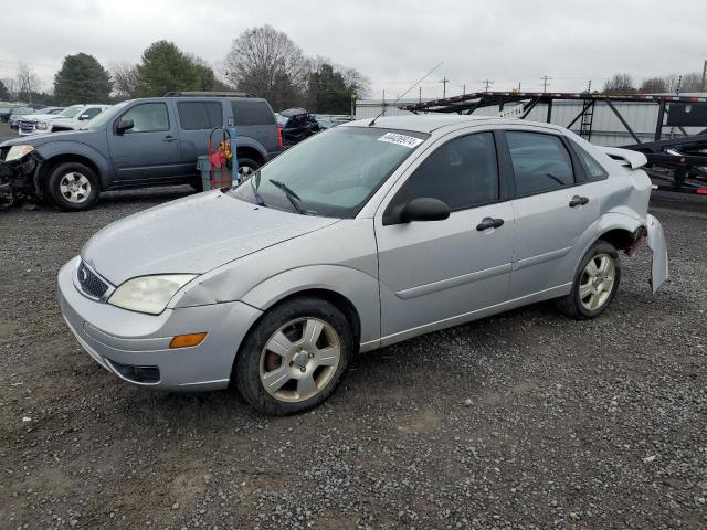 1FAFP34N45W122593 - 2005 FORD FOCUS ZX4 GRAY photo 1