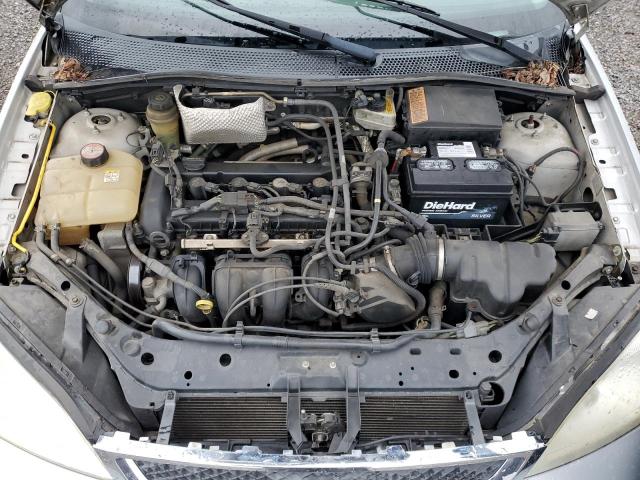 1FAFP34N45W122593 - 2005 FORD FOCUS ZX4 GRAY photo 11