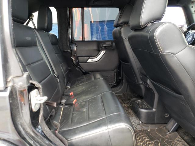 1C4HJWEGXCL192068 - 2012 JEEP WRANGLER U SAHARA BLACK photo 10