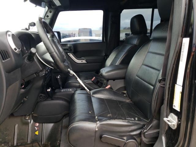 1C4HJWEGXCL192068 - 2012 JEEP WRANGLER U SAHARA BLACK photo 7