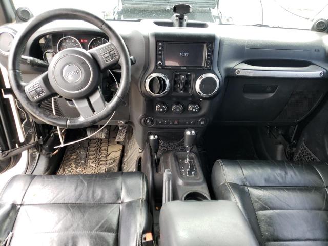 1C4HJWEGXCL192068 - 2012 JEEP WRANGLER U SAHARA BLACK photo 8