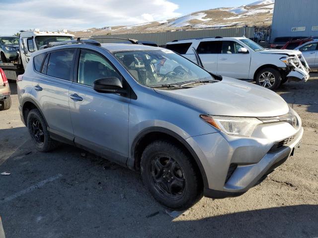 JTMBFREV4JJ241586 - 2018 TOYOTA RAV4 LE SILVER photo 4