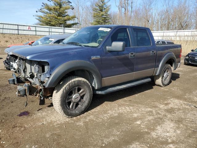 1FTPW14565KE81862 - 2005 FORD F150 SUPERCREW BLUE photo 1