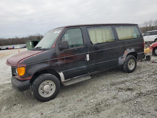 1FMRE11W84HA53629 - 2004 FORD ECONOLINE E150 WAGON BLACK photo 1