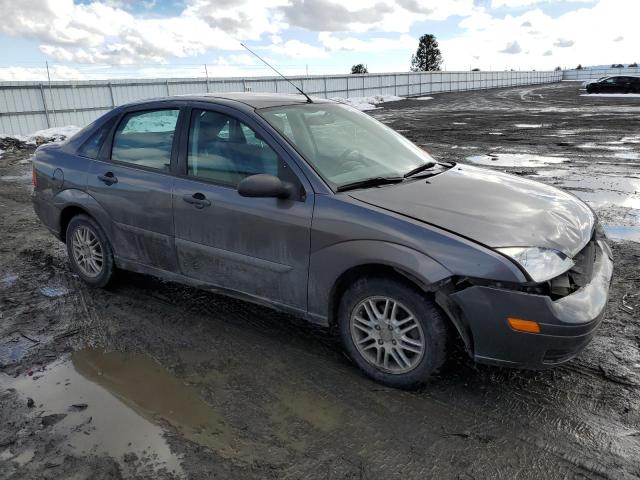 1FAFP34N76W242437 - 2006 FORD FOCUS ZX4 GRAY photo 4