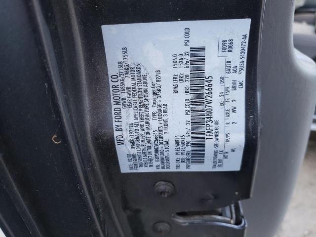 1FAFP34N07W266645 - 2007 FORD FOCUS ZX4 GRAY photo 12