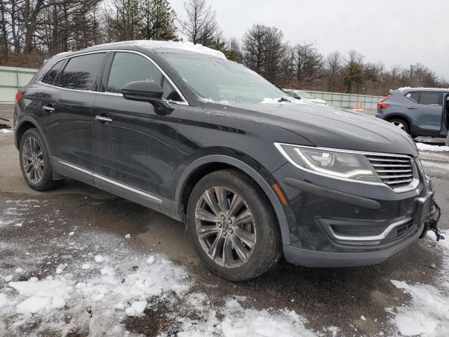 2LMTJ8LP0GBL31283 - 2016 LINCOLN MKX RESERVE BLACK photo 4