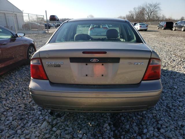 1FAFP34N05W133929 - 2005 FORD FOCUS ZX4 TAN photo 6