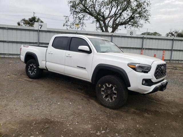 3TMDZ5BN7PM162597 - 2023 TOYOTA TACOMA DOUBLE CAB WHITE photo 4