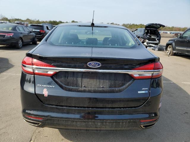 3FA6P0T90HR173891 - 2017 FORD FUSION SE BLACK photo 6