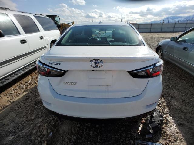 3MYDLBYV7KY513972 - 2019 TOYOTA YARIS L WHITE photo 6