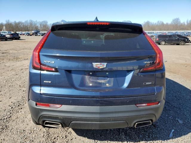 1GYFZBR45MF012627 - 2021 CADILLAC XT4 LUXURY BLUE photo 6