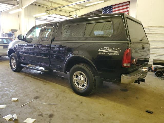 1FTRX18L7XNC12284 - 1999 FORD F150 BLACK photo 2