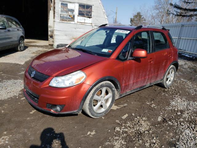 JS2YB417885104692 - 2008 SUZUKI SX4 TOURING ORANGE photo 1