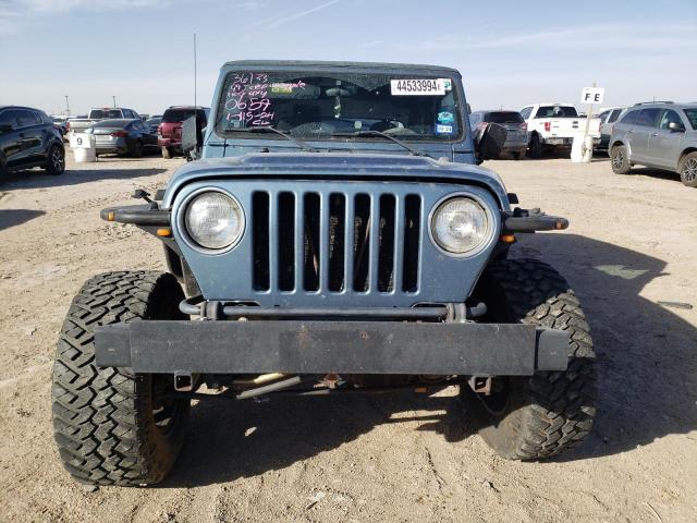 1J4FY19S8XP460659 - 1999 JEEP WRANGLER / SPORT BLUE photo 5