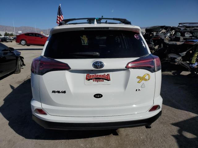 JTMZFREV3JJ743987 - 2018 TOYOTA RAV4 LE WHITE photo 6