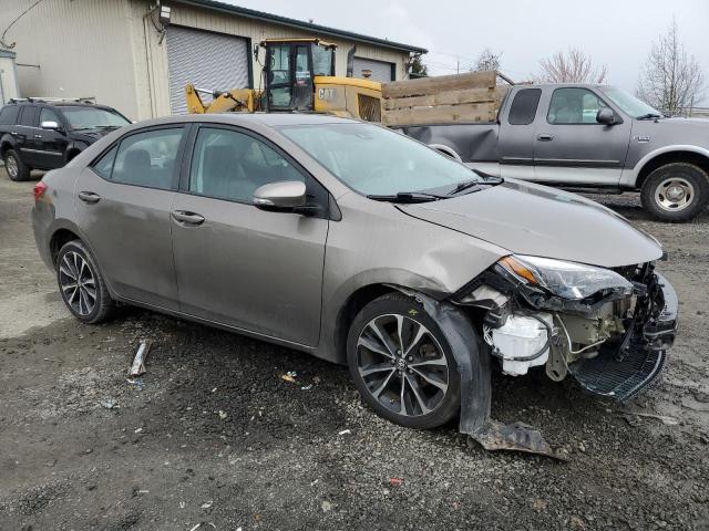 5YFBURHE7HP637633 - 2017 TOYOTA COROLLA L BROWN photo 4