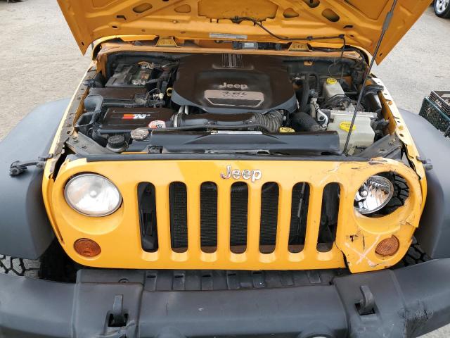1C4BJWDG9CL183661 - 2012 JEEP WRANGLER U SPORT ნარინჯისფერი ფოტო 12