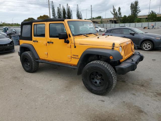 1C4BJWDG9CL183661 - 2012 JEEP WRANGLER U SPORT ნარინჯისფერი ფოტო 4