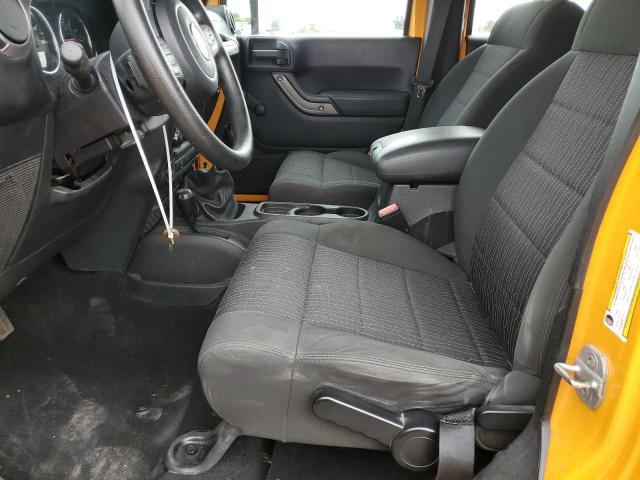 1C4BJWDG9CL183661 - 2012 JEEP WRANGLER U SPORT ნარინჯისფერი ფოტო 7