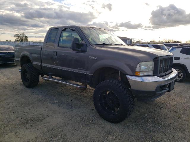 1FTNX21F53EA96697 - 2003 FORD F250 SUPER DUTY GRAY photo 4