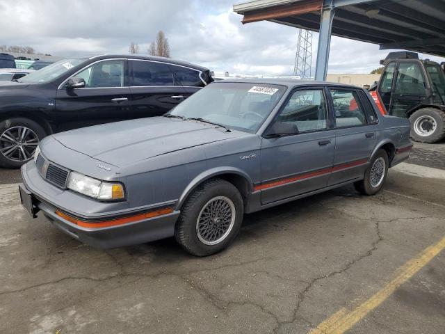2G3AJ5133J2335499 - 1988 OLDSMOBILE CUTLASS CI GRAY photo 1