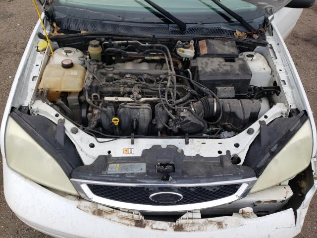 1FAFP34N45W121380 - 2005 FORD FOCUS ZX4 WHITE photo 11