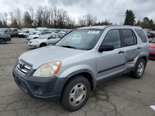 JHLRD68515C010320 - 2005 HONDA CR-V LX SILVER photo 1