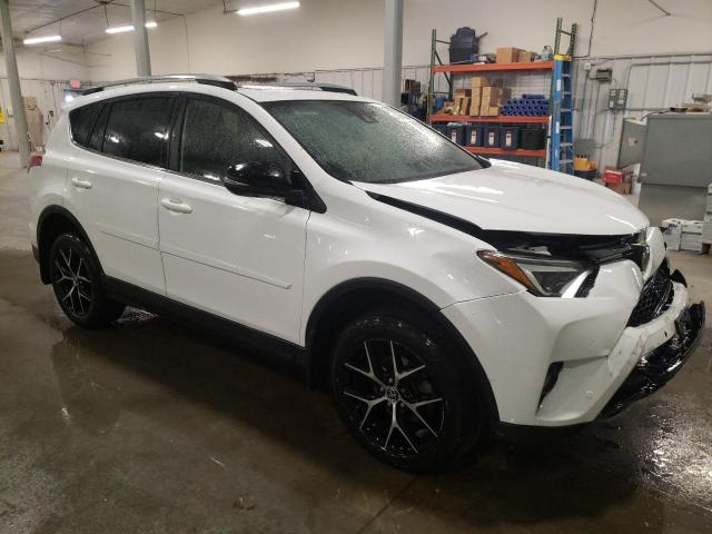 JTMJFREV8HJ143764 - 2017 TOYOTA RAV4 SE WHITE photo 4