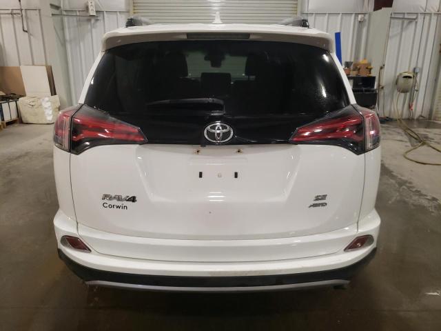 JTMJFREV8HJ143764 - 2017 TOYOTA RAV4 SE WHITE photo 6