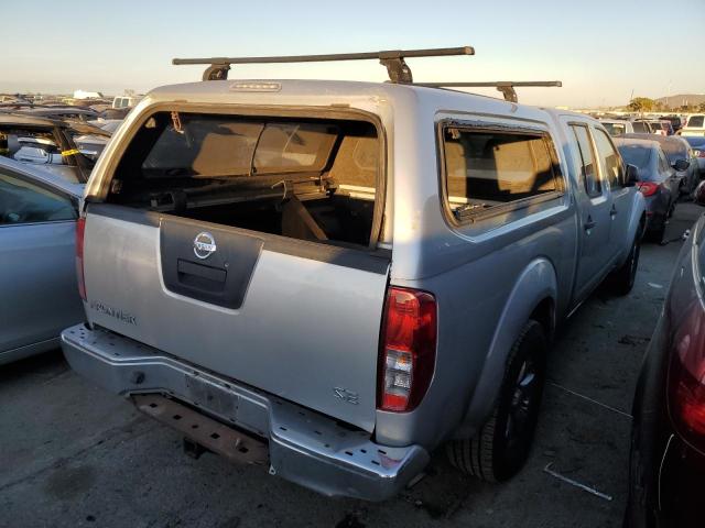 1N6AD0FR7AC414369 - 2010 NISSAN FRONTIER CREW CAB SE SILVER photo 3