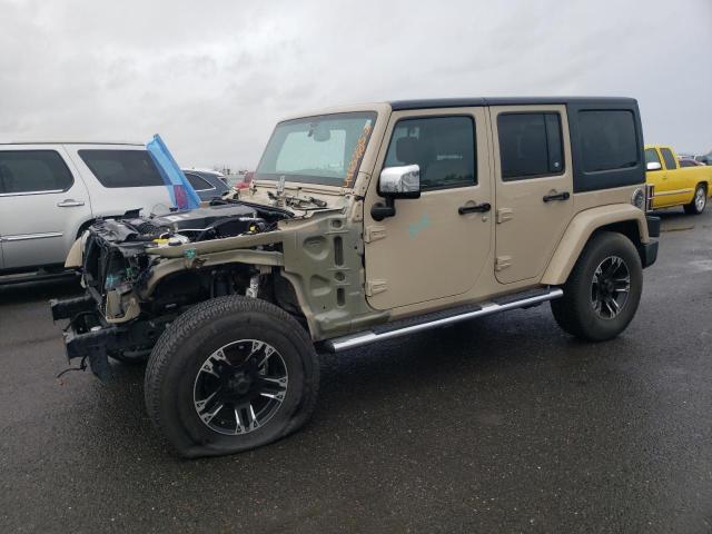 1C4BJWEG7GL282015 - 2016 JEEP WRANGLER U SAHARA TAN photo 1