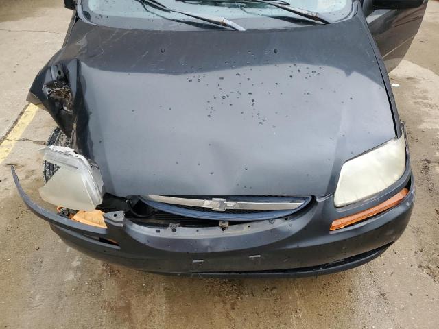 KL1TD56666B676869 - 2006 CHEVROLET AVEO BASE BLACK photo 11