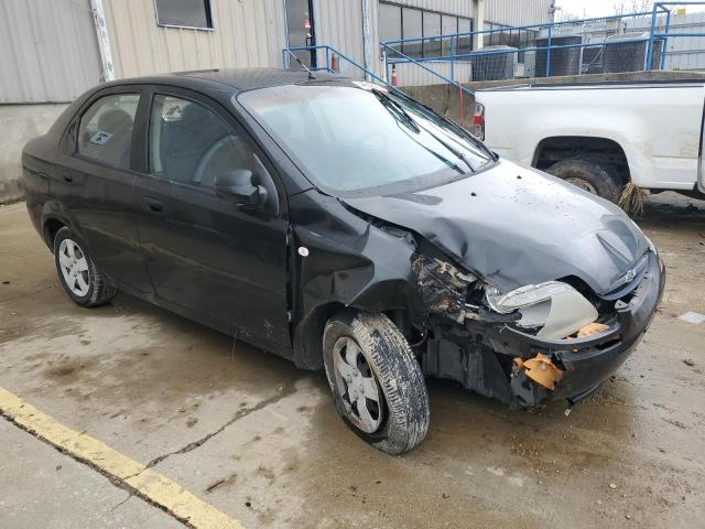 KL1TD56666B676869 - 2006 CHEVROLET AVEO BASE BLACK photo 4