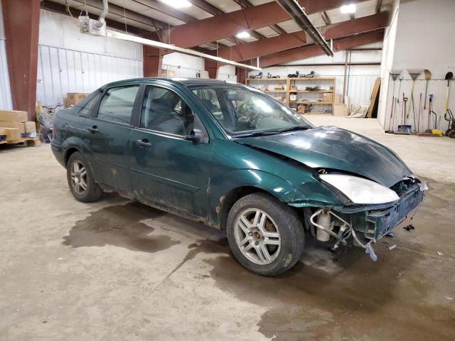 1FAFP34P3YW334892 - 2000 FORD FOCUS SE GREEN photo 4