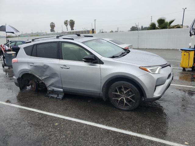 JTMNFREV0JJ186549 - 2018 TOYOTA RAV4 SE SILVER photo 4