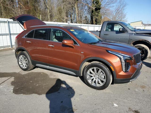 1GYFZCR45MF080514 - 2021 CADILLAC XT4 PREMIUM LUXURY ORANGE photo 4