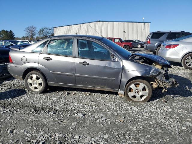 1FAHP34N77W313355 - 2007 FORD FOCUS ZX4 GRAY photo 4