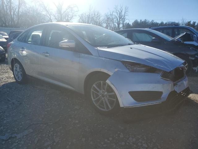 1FADP3F21HL302565 - 2017 FORD FOCUS SE SILVER photo 4