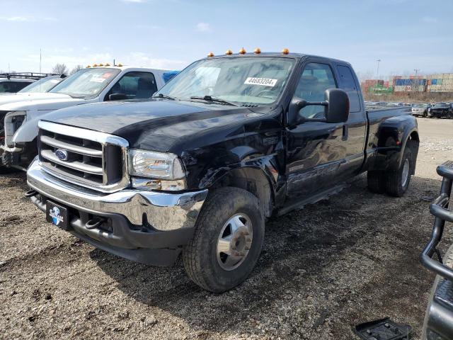 1FTWX33P54EA35223 - 2004 FORD F350 SUPER DUTY BLACK photo 1